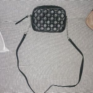 NWOT Rebecca Minkoff black lambskin quilted and studded leather crossbody.